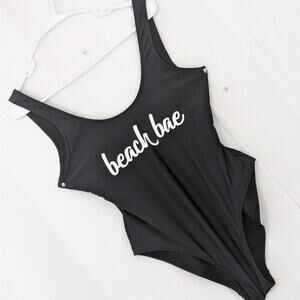 NWOT! NOBO! BLACK/WHITE "BEACH BAE" GRAPHIC, HIGH CUT TANK SWIMSUIT! SZ M- 7-9